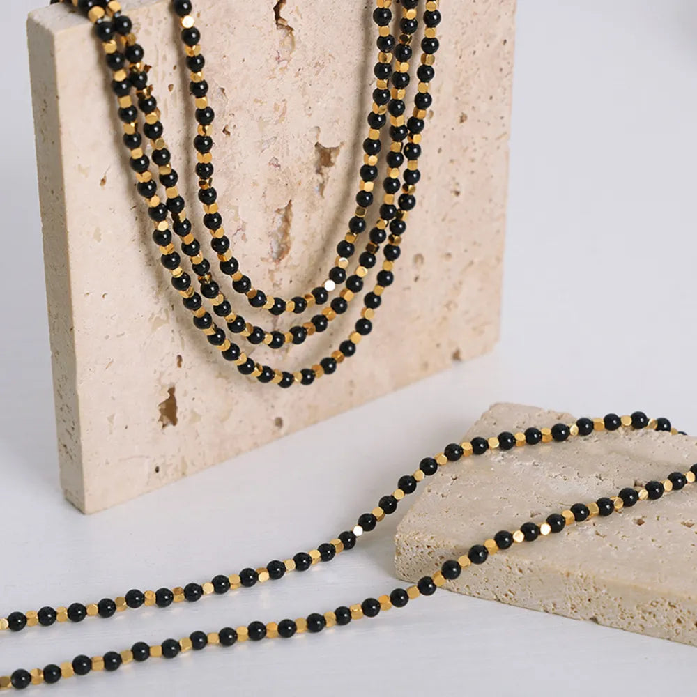Collier en Acier Titane & Perles d'Agate – Élégance Naturelle