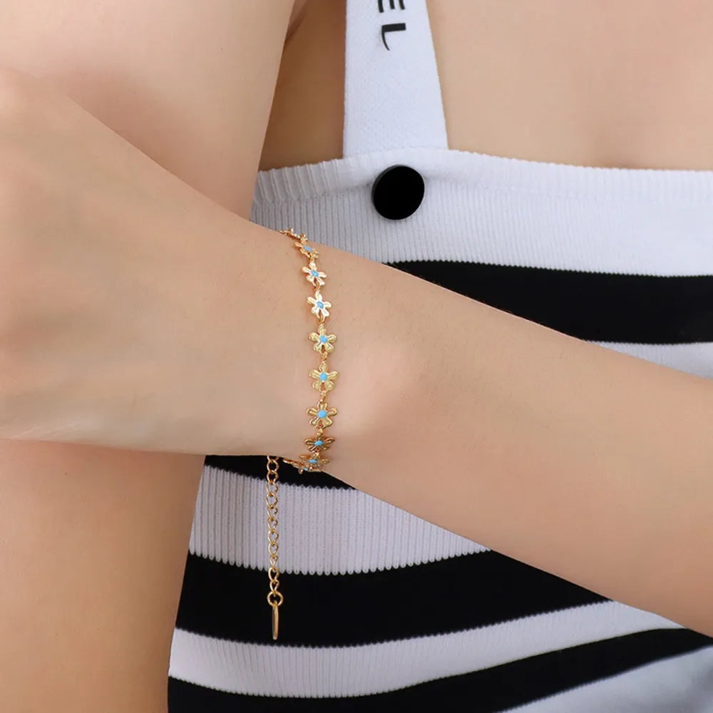Bracelet Fleur Goutte – Acier Titane Doré & Goutte d’Huile