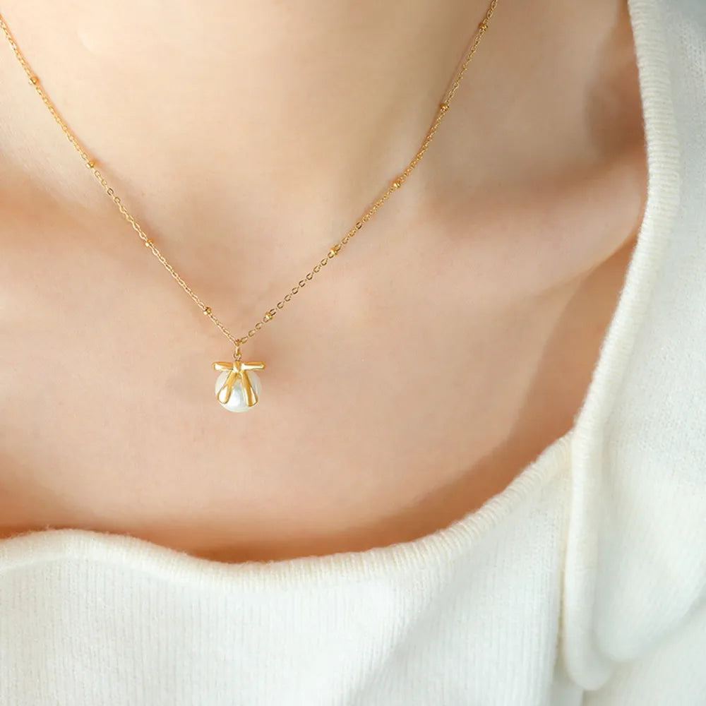 Collier Nœud en Nacre & Or