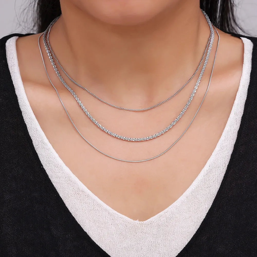Collier Multi-Rangs Acier Titane – Élégance Superposée