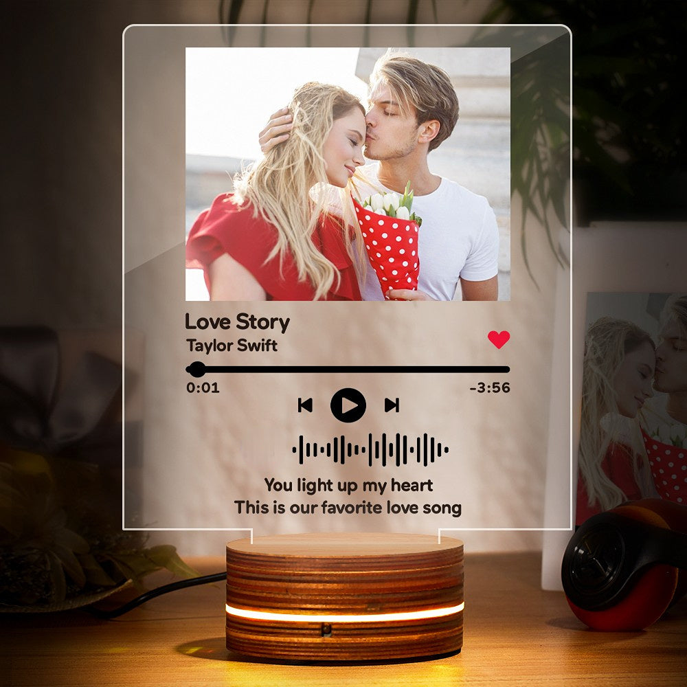 Personalized music plaque with photo, song title, and Spotify code, illuminated by a warm night light, perfect for gifting