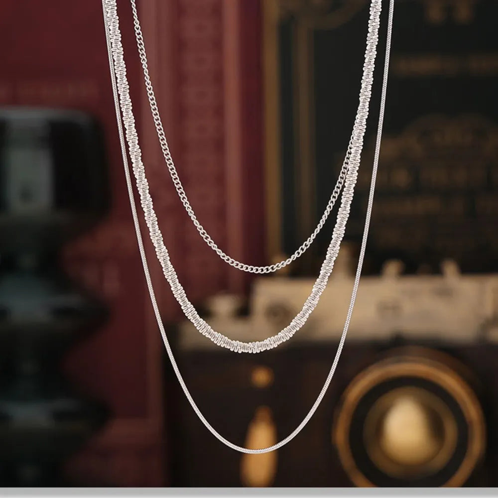 Collier Multi-Rangs Acier Titane – Élégance Superposée