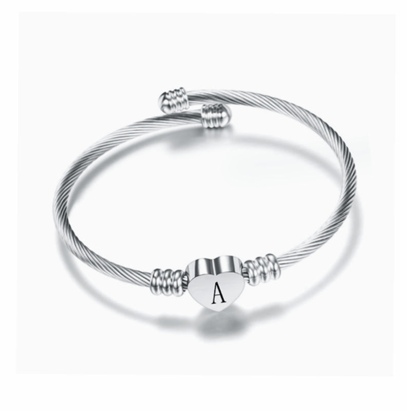 Bracelet Initiale – Acier tressé & Lettre personnalisée (A à Z) Un bijou symbolique, fin et tendance