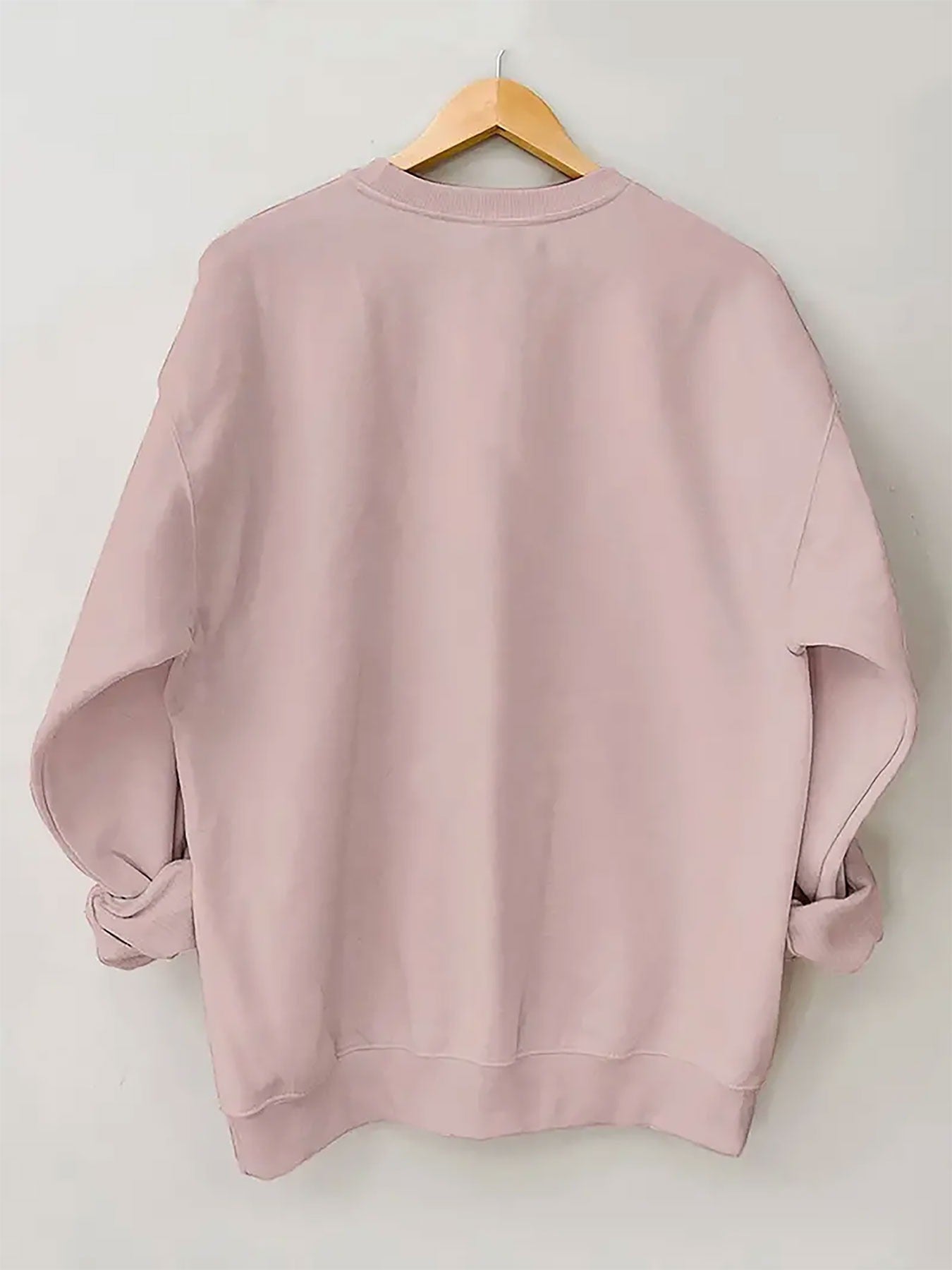 Sweat de Noël Rose “Teckel Festif” – Col Rond & Détails Mignons