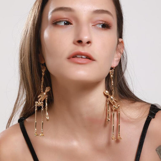 Boucles d’Oreilles Squelettes Articulées