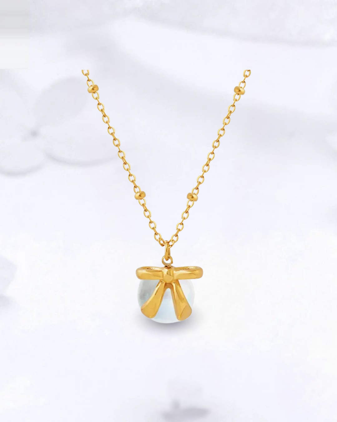 Collier Nœud en Nacre & Or