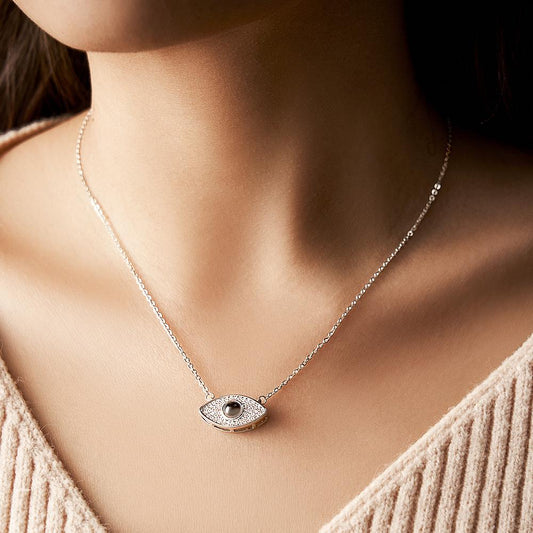 Silver Evil Eye Projection Necklace with Custom Photo, a unique and thoughtful gift.
