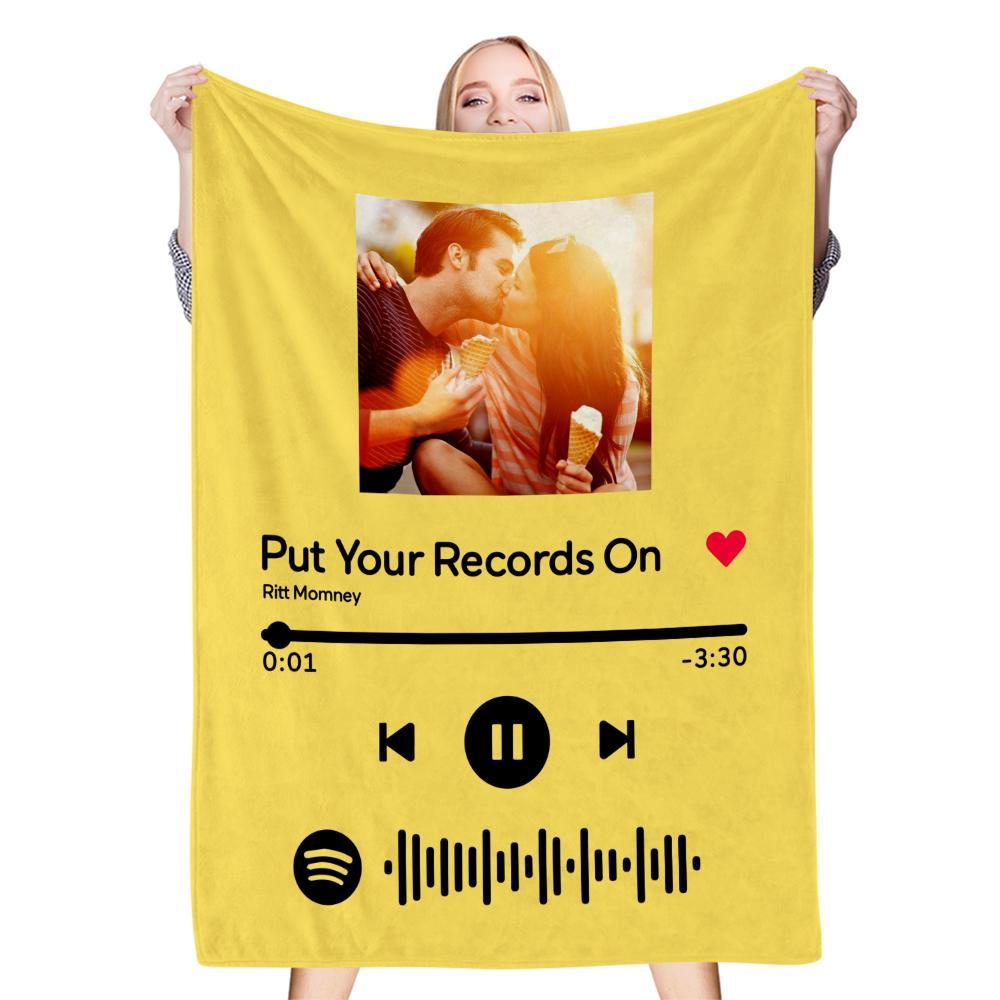 Yellow Spotify code blanket with couple's photo and song lyrics, perfect gift